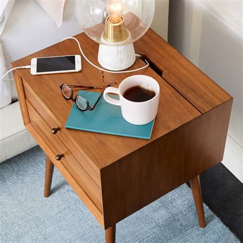 MULTI-STORAGE CHOICES. . Nightstands with charging ports